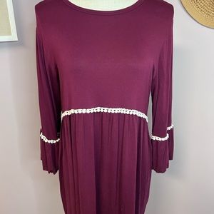 Women’s Medium/Large maroon 3/4 sleeve flowy tunic style blouse.